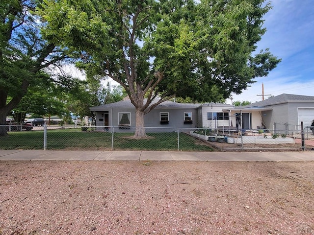 2602 3rd Ave, Pueblo, CO 81003 - view of front of house with a fenced front yard