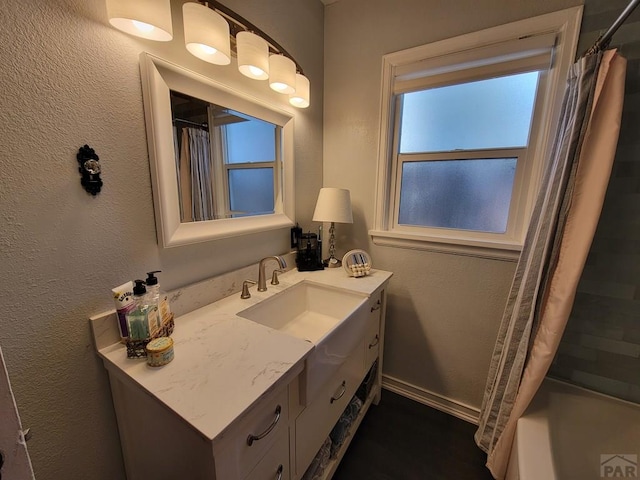 2602 3rd Ave, Pueblo, CO 81003 - bathroom with vanity and shower / tub combo with curtain
