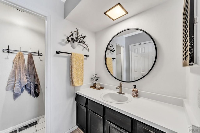 bathroom featuring visible vents and vanity