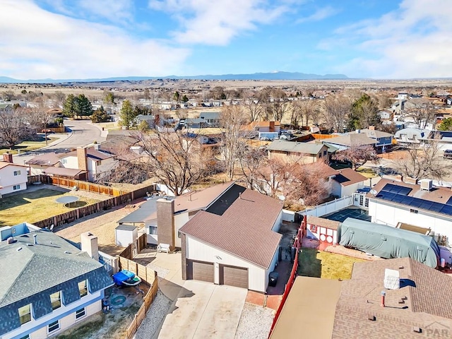 drone / aerial view with a mountain view and a residential view