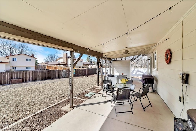 view of patio / terrace with outdoor dining space and a fenced backyard