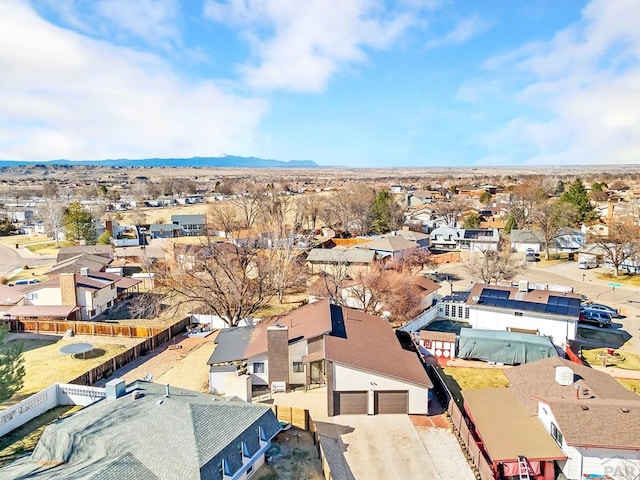 bird's eye view featuring a residential view and a mountain view