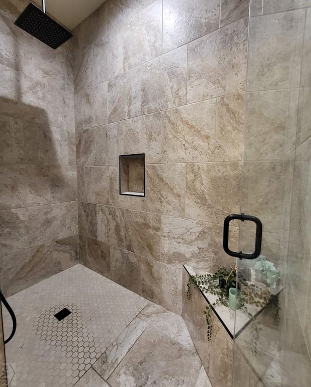 full bath featuring a stall shower