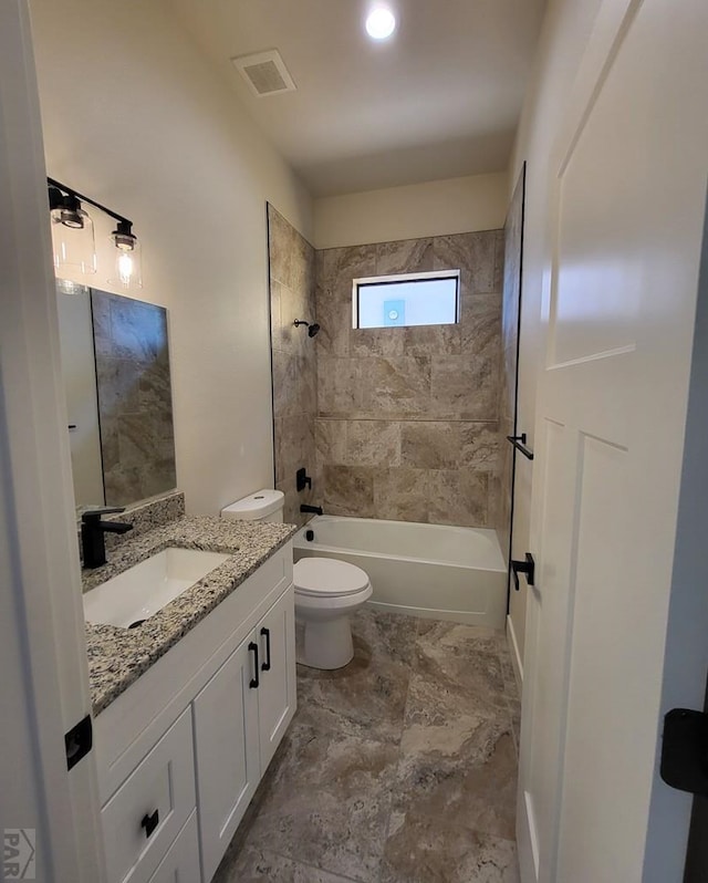 bathroom featuring toilet, shower / bathing tub combination, vanity, and visible vents