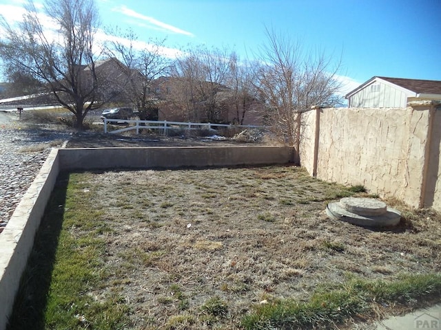 view of yard featuring fence