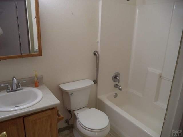 full bathroom featuring toilet, bathtub / shower combination, and vanity