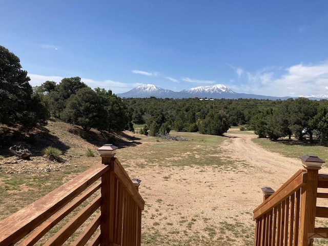 view of mountain feature with a rural view