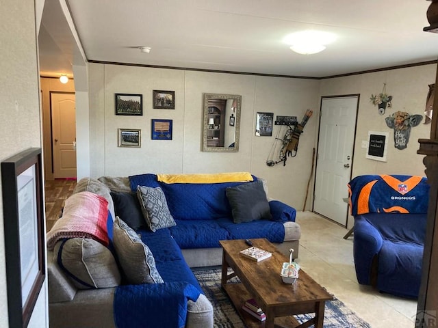living room with ornamental molding