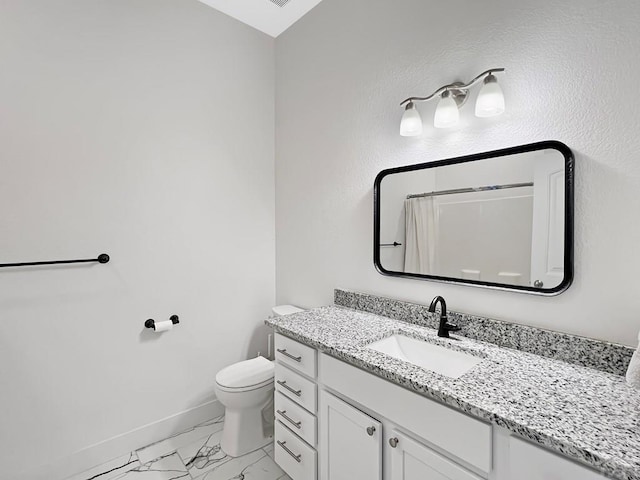 bathroom featuring curtained shower, marble finish floor, toilet, vanity, and baseboards