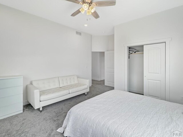 carpeted bedroom with ceiling fan, recessed lighting, visible vents, and a closet