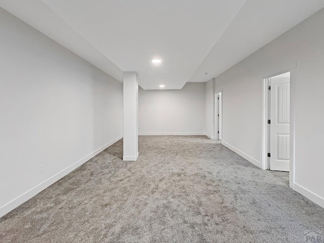 finished basement featuring baseboards, carpet, and recessed lighting
