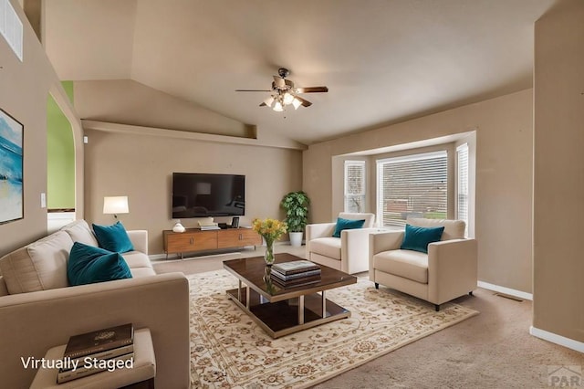 carpeted living room featuring visible vents, ceiling fan, vaulted ceiling, and baseboards