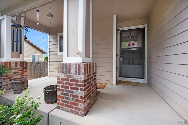 7365 Far Hill Dr, Colorado Springs, CO 80922 - doorway to property with covered porch