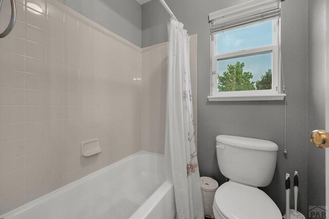7365 Far Hill Dr, Colorado Springs, CO 80922 - full bath featuring shower / tub combo with curtain and toilet
