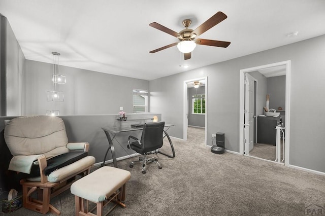 7365 Far Hill Dr, Colorado Springs, CO 80922 - carpeted home office with ceiling fan and baseboards