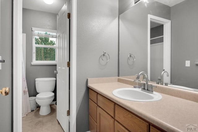 7365 Far Hill Dr, Colorado Springs, CO 80922 - full bath with toilet, vanity, and tile patterned floors