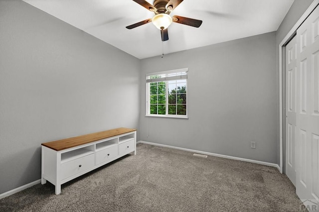 7365 Far Hill Dr, Colorado Springs, CO 80922 - unfurnished bedroom with carpet, baseboards, a ceiling fan, and a closet