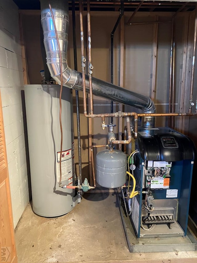 utility room with water heater and a heating unit