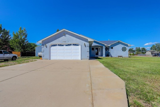 single story home featuring a garage, driveway, a front lawn, and stucco siding