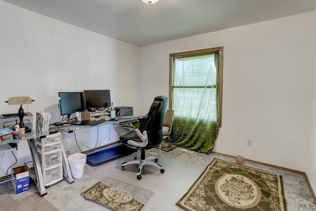 office space featuring baseboards