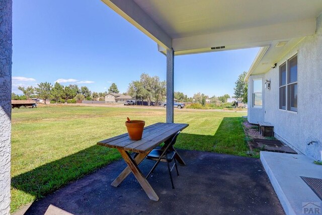 view of patio / terrace with visible vents