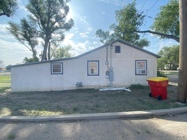 exterior space featuring stucco siding