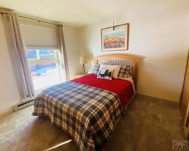 44 Valley Vista Rd Unit 35, Cuchara, CO 81055 - bedroom featuring a baseboard radiator and carpet