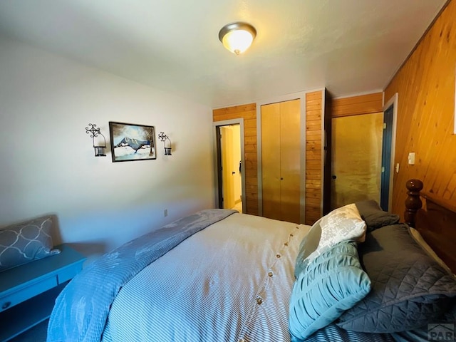 44 Valley Vista Rd Unit 35, Cuchara, CO 81055 - bedroom featuring wood walls