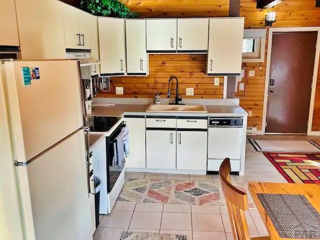 44 Valley Vista Rd Unit 35, Cuchara, CO 81055 - kitchen with light countertops, a sink, white cabinetry, light tile patterned floors, and white appliances