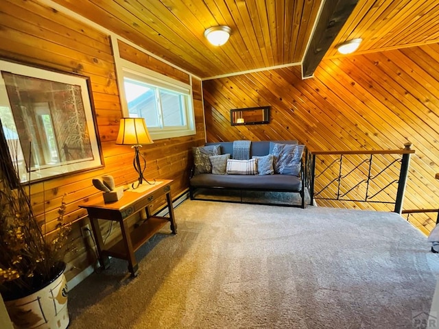44 Valley Vista Rd Unit 35, Cuchara, CO 81055 - living area with wood walls, carpet, baseboard heating, beam ceiling, and wood ceiling