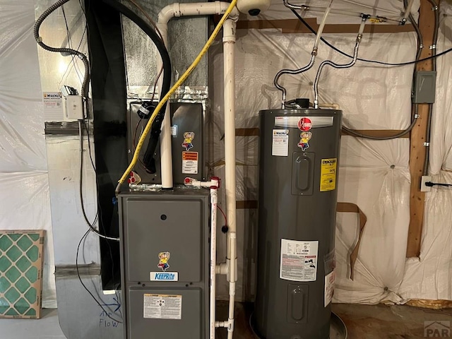 utility room featuring water heater