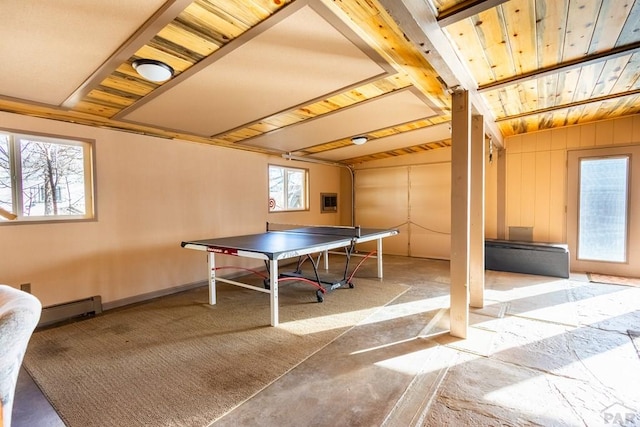 game room featuring lofted ceiling, carpet floors, a baseboard radiator, and wooden ceiling