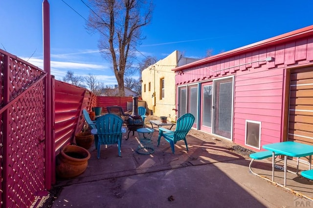 view of patio with fence