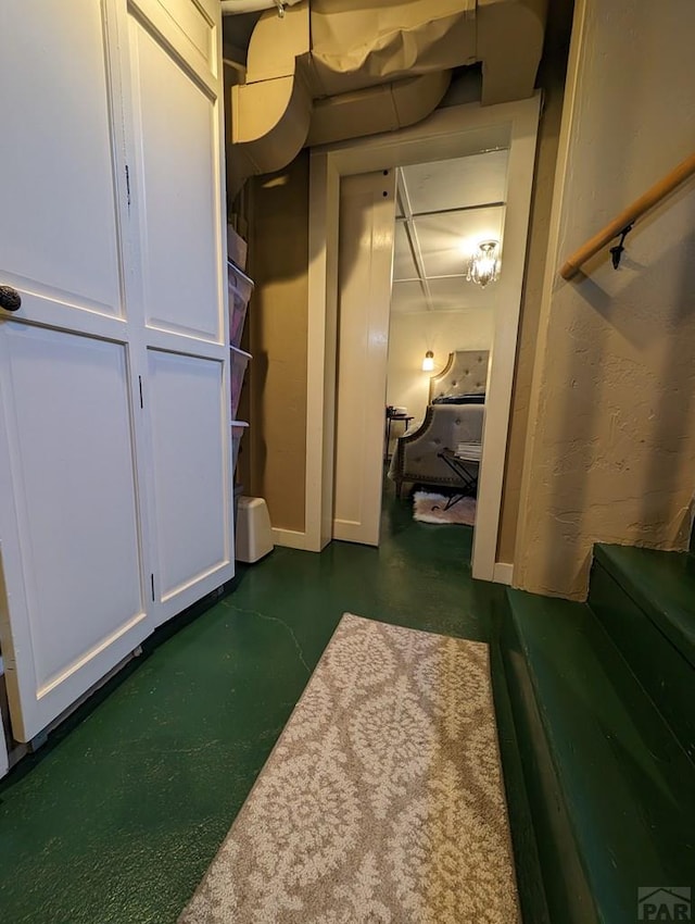 interior space featuring finished concrete flooring