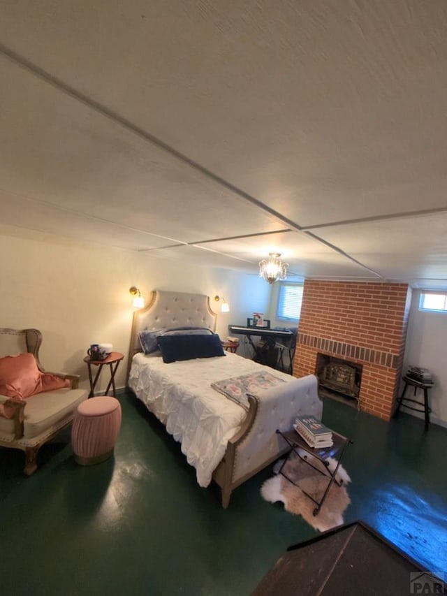 bedroom with multiple windows and concrete floors