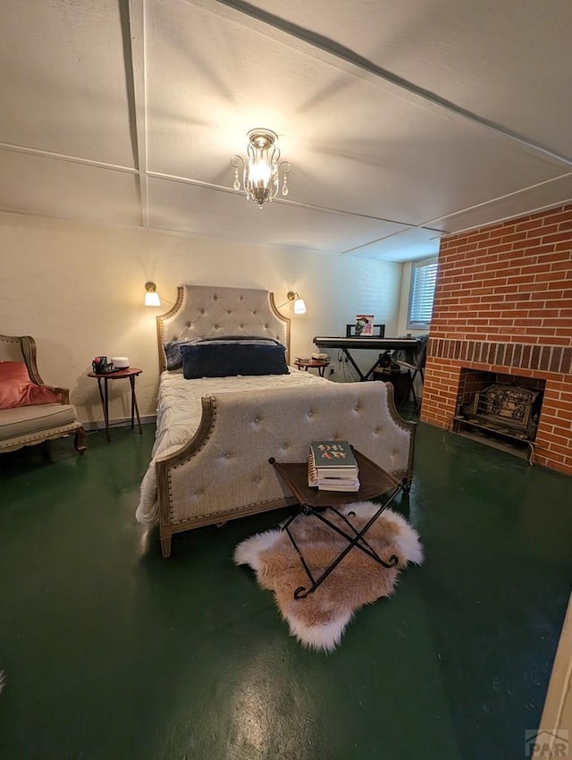 bedroom featuring brick wall, a fireplace, and finished concrete floors