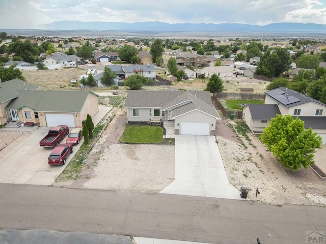 birds eye view of property featuring a residential view and a mountain view