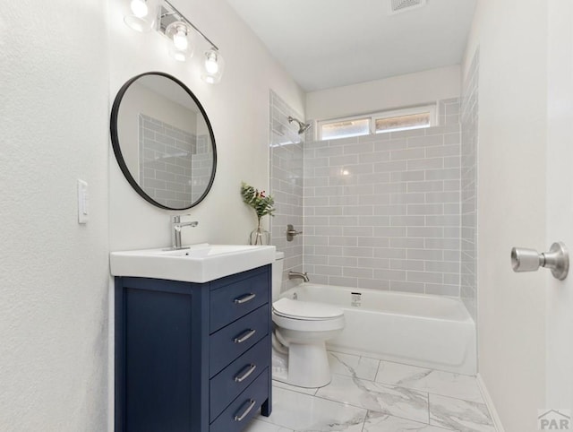 bathroom with baseboards, bathing tub / shower combination, toilet, marble finish floor, and vanity