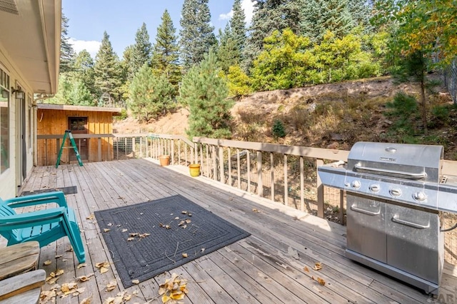 wooden terrace with a bar