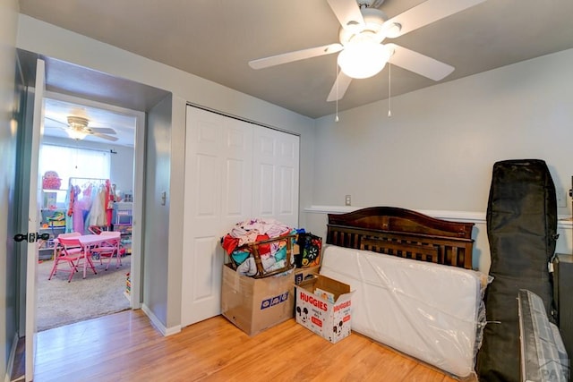 4465 London Ln, Colorado Springs, CO 80916 - bedroom with wood finished floors, ceiling fan, and a closet
