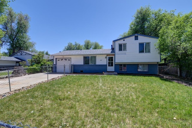 4465 London Ln, Colorado Springs, CO 80916 - tri-level home featuring driveway and a garage