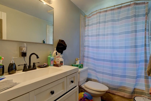 4465 London Ln, Colorado Springs, CO 80916 - full bath featuring toilet, vanity, and curtained shower
