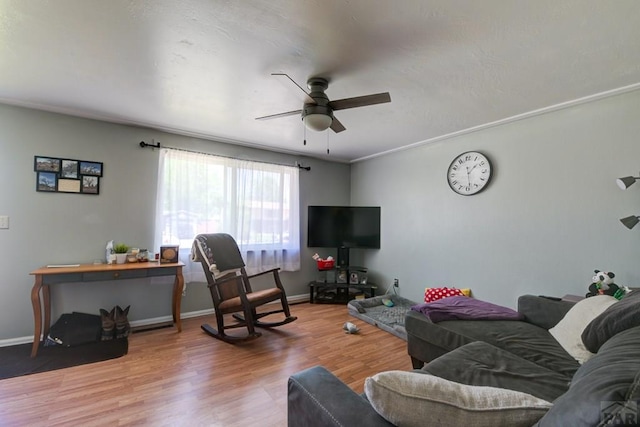 4465 London Ln, Colorado Springs, CO 80916 - living area with ceiling fan, wood finished floors, and baseboards