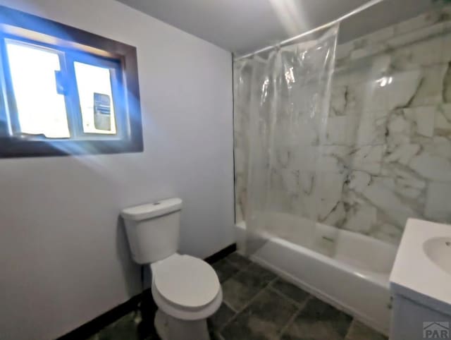 428 Elm Ave, Las Animas, CO 81054 - full bathroom featuring shower / bath combination with curtain and vanity