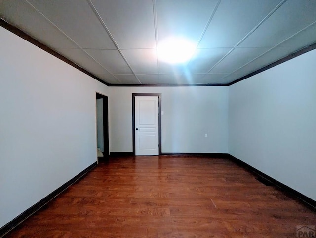 428 Elm Ave, Las Animas, CO 81054 - bonus room with dark wood-style flooring and baseboards