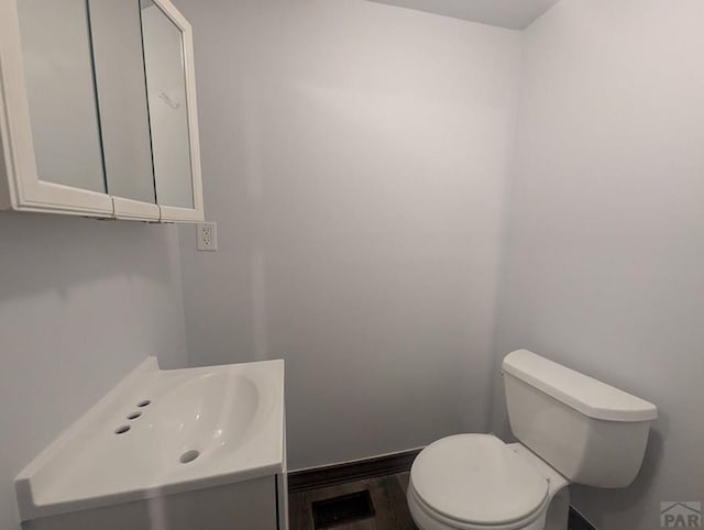 428 Elm Ave, Las Animas, CO 81054 - half bath featuring toilet and vanity
