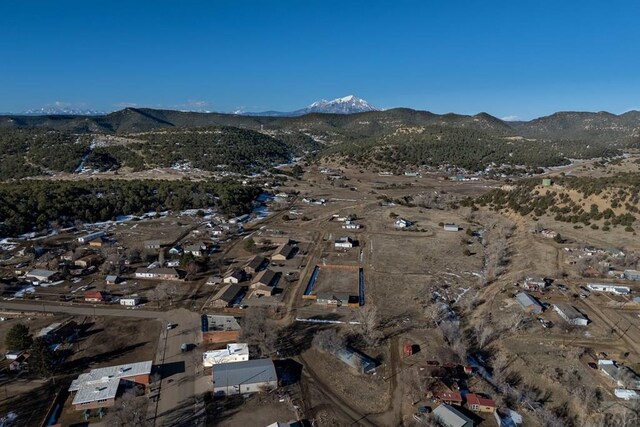 bird's eye view with a residential view and a mountain view