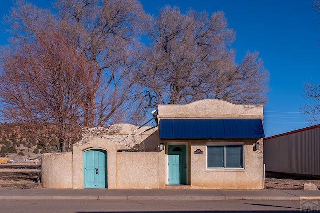 view of front of home with stucco siding