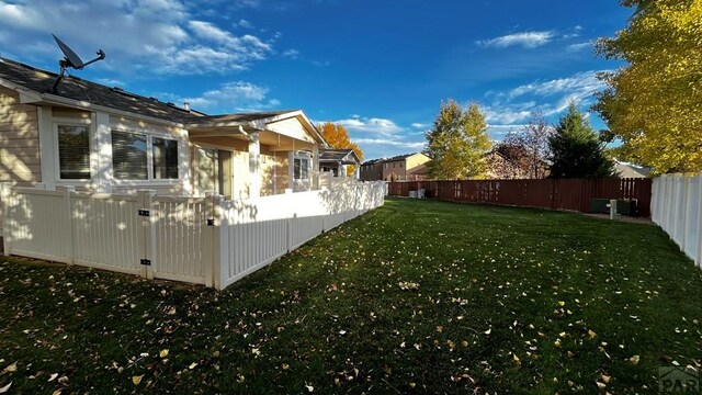 view of yard featuring a fenced backyard