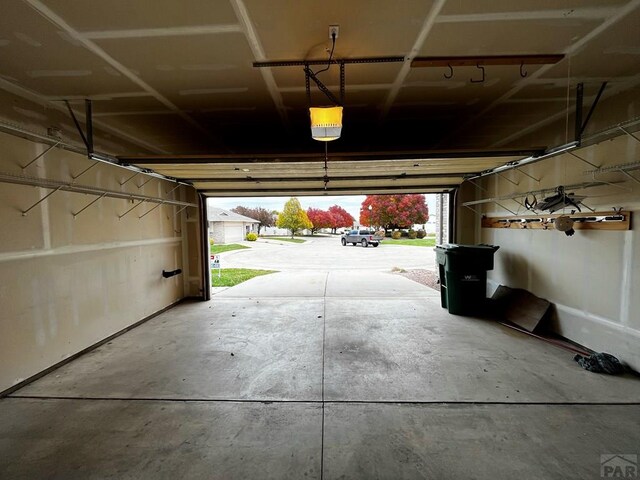 garage featuring a garage door opener